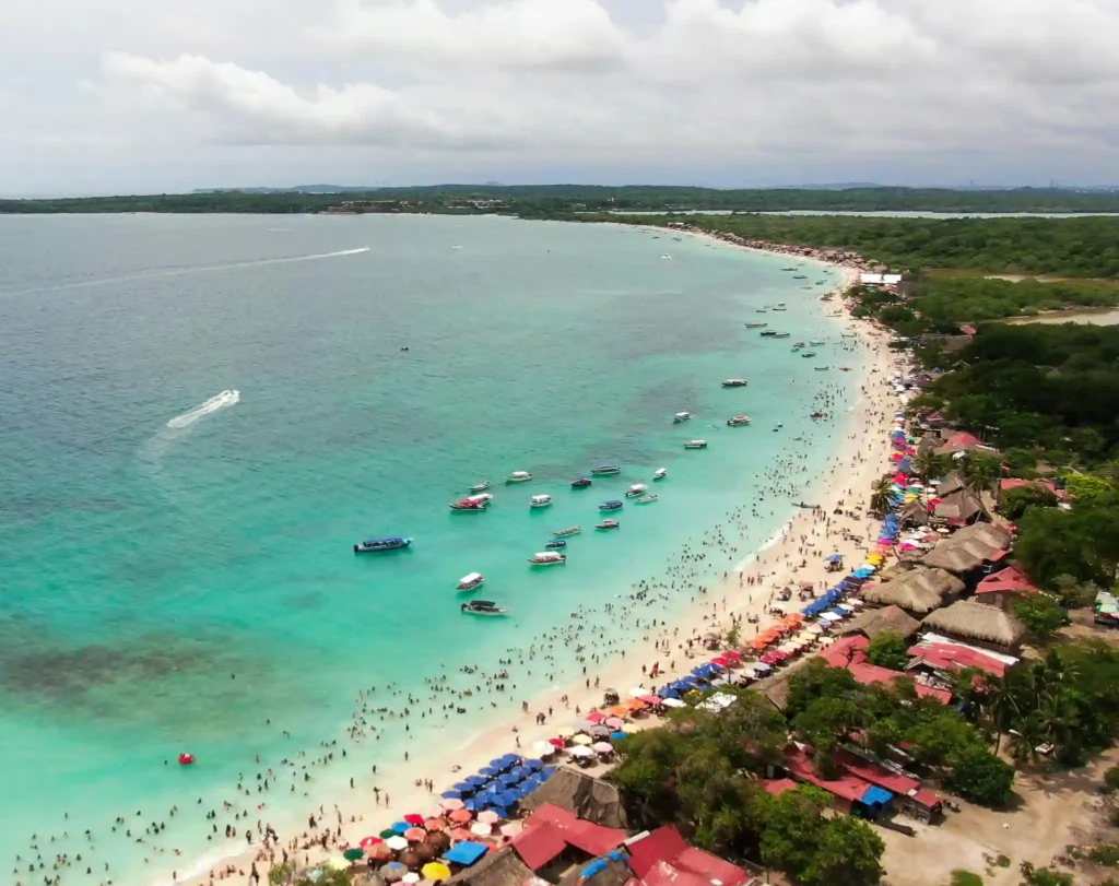 tropical beach crowd turquoise water